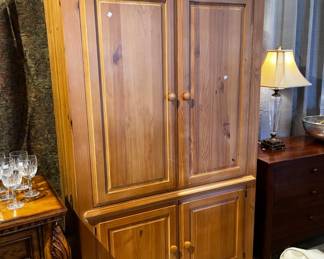 Bassett Pine Armoire 44"W X 24"D X 83"T C2507 $100. You can purchase this item at the Tent sale at The Avant Garden located at 140 N 20th St in Ozark or call (417) 485-4857 to purchase over the phone.