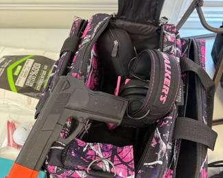 Women’s shooting bag, never used with ear protection , practice gun, and more accessories.
