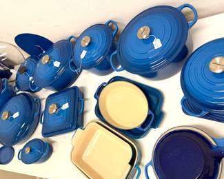 Over 50 pieces of new or like new Le Cruset and Staun