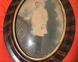 Antique photo with convex glass frame