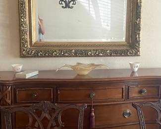 another view of buffet and mirror