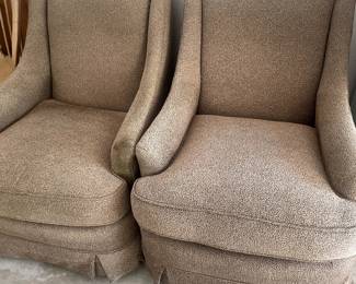 two brown fabic chairs