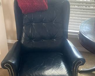 Close up of two blue leather chairs