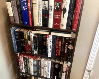 Bookcase with hard cover books. Books will be sold separately.