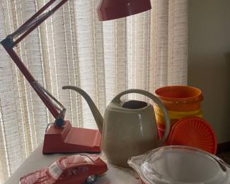 70s desk lamp, watering can, containers, tablecloth, model car.