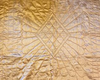 Vintage gold satin bed coverlet with embroidered rose