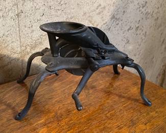 Antique cast iron cherry pitter