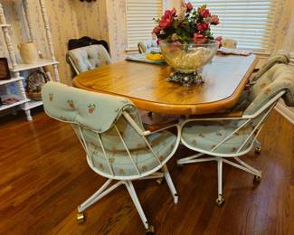 Kitchen table with two leaves, six chairs. shown with leaves. Punch bowl with metal base.