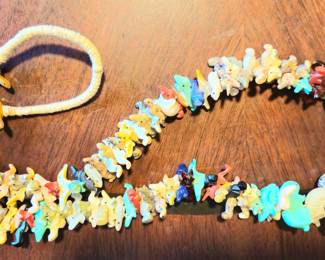 Vintage Zuni 130 fetish necklace with Squawl wrap. Sleeping Beauty mine turquoise and various stones. 30 inch. Excellent condition.