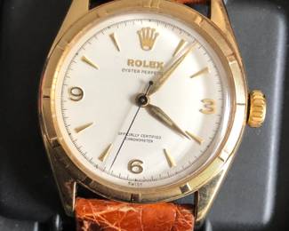 14k Rolex Oyster Perpetual watch, working condition. Original buckle. "Ovettone" model. Crown was available 1951-1953. No box or papers.
