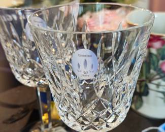 Set of four Lismore claret glasses. New with stickers.