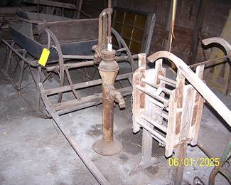 Horse drawn sleigh, pump, washtub stand