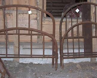 Two metal beds