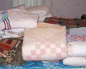 Quilts, chenille bedspreads, etc...