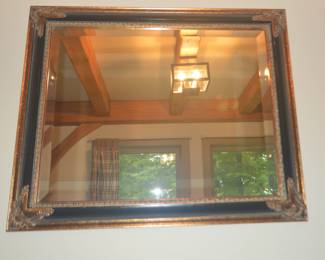 Lovely black and gold embellished mirror