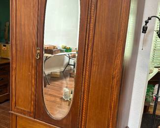 Mirrored wardrobe with drawer.