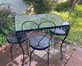 Iron table and 4 ice cream chairs