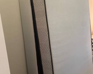Two sets of twin mattress and box springs.