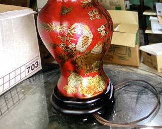 Hand painted leather stretched around base