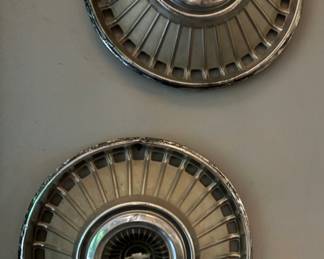 4 Old Chevrolet Hubcaps