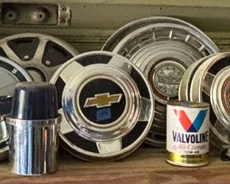 Assortment of vintage hub caps. Ford, Cadillac, BMW, Chevrolet, GMC, VW, Buick