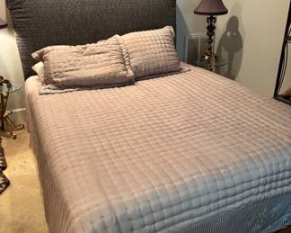 Queen Bed with Rolled Upholstered Headboard
