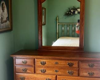 Dresser with attached mirror