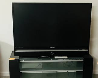 TV is big but it works ! Entertainment center for sale. Yellow post ~its throughout home provide dimensions