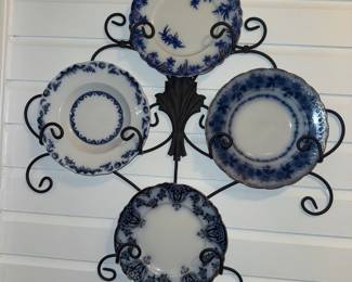 More flow blue plates. All hanging shelves are also for sale.