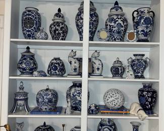 Blue and white decor plus shore birds and cats. There are cats in every room