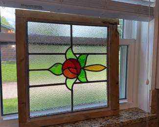 Gorgeous reclaimed rose bud stained glass in original window frame