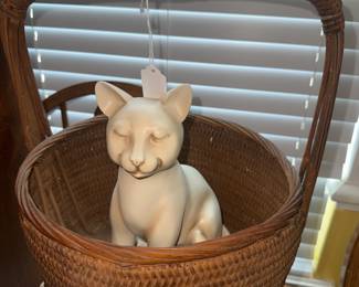 Kitty in a primitive basket