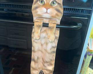 Hang in there kitty. Dinner is almost ready!