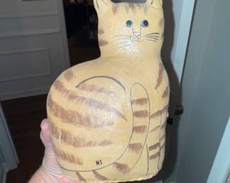 This kitty is made of leather like the old carnival ones.