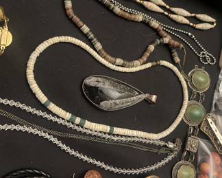 There are a few pieces of nice sterling silver jewelry.