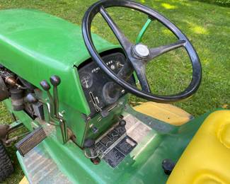 John Deer riding mowers with accessories