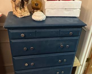 Small blue chest, thinking man, ruby red glasses, "how dry I am" decantor