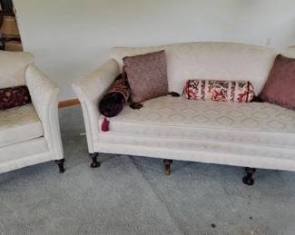 Off white upholstered sofa and chair