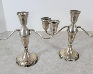 Pair of Duchin Creation weighted sterling candelabras