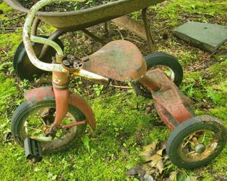 Vintage tricycle and wheelbarrow yard decor