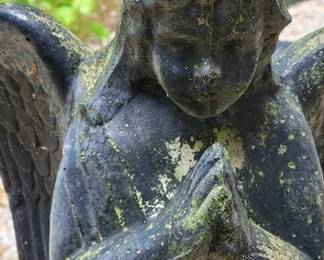 Outdoor concrete angel statue