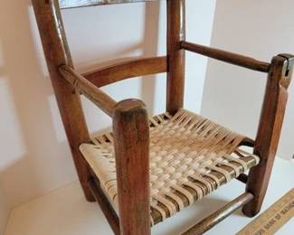 Primitive child's chunky wood and woven seat chair