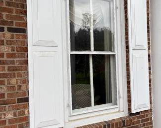 Exterior window shutters
