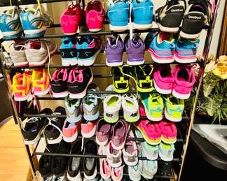 There are several of these racks within the home.  Can't be Tina's because I don't see any heels.