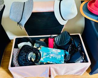 Boxes of purses.  No, none of them come with money inside.