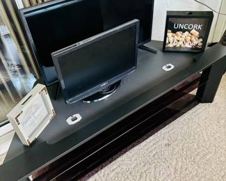 Never thought of having more than one tv on a stand.