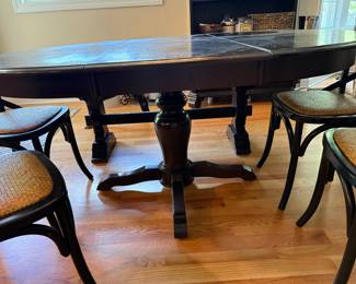 Marshall Fields black wooden pedestal table (one leaf)