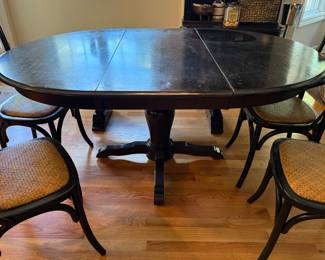 Marshall Fields black wooden pedestal table (one leaf)