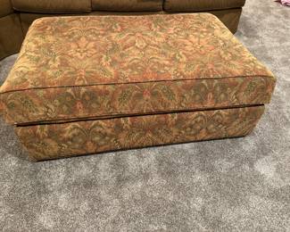 Upholstered storage ottoman