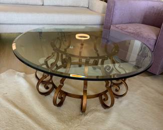 Contemporary glass top cocktail table